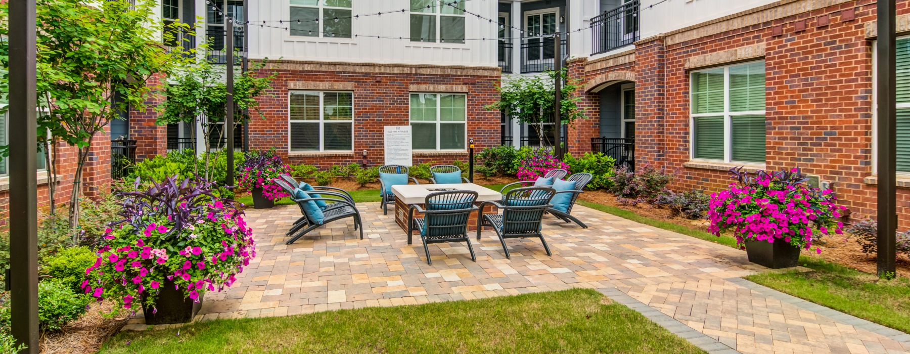 Outdoor courtyard seating area at Marketplace Village apartments in Marietta, Georgia